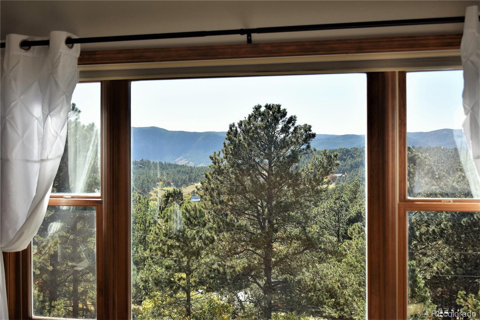 2355 Bricker Road Monument, CO 80132 - Photo 14 of 35 a view of a window in a room