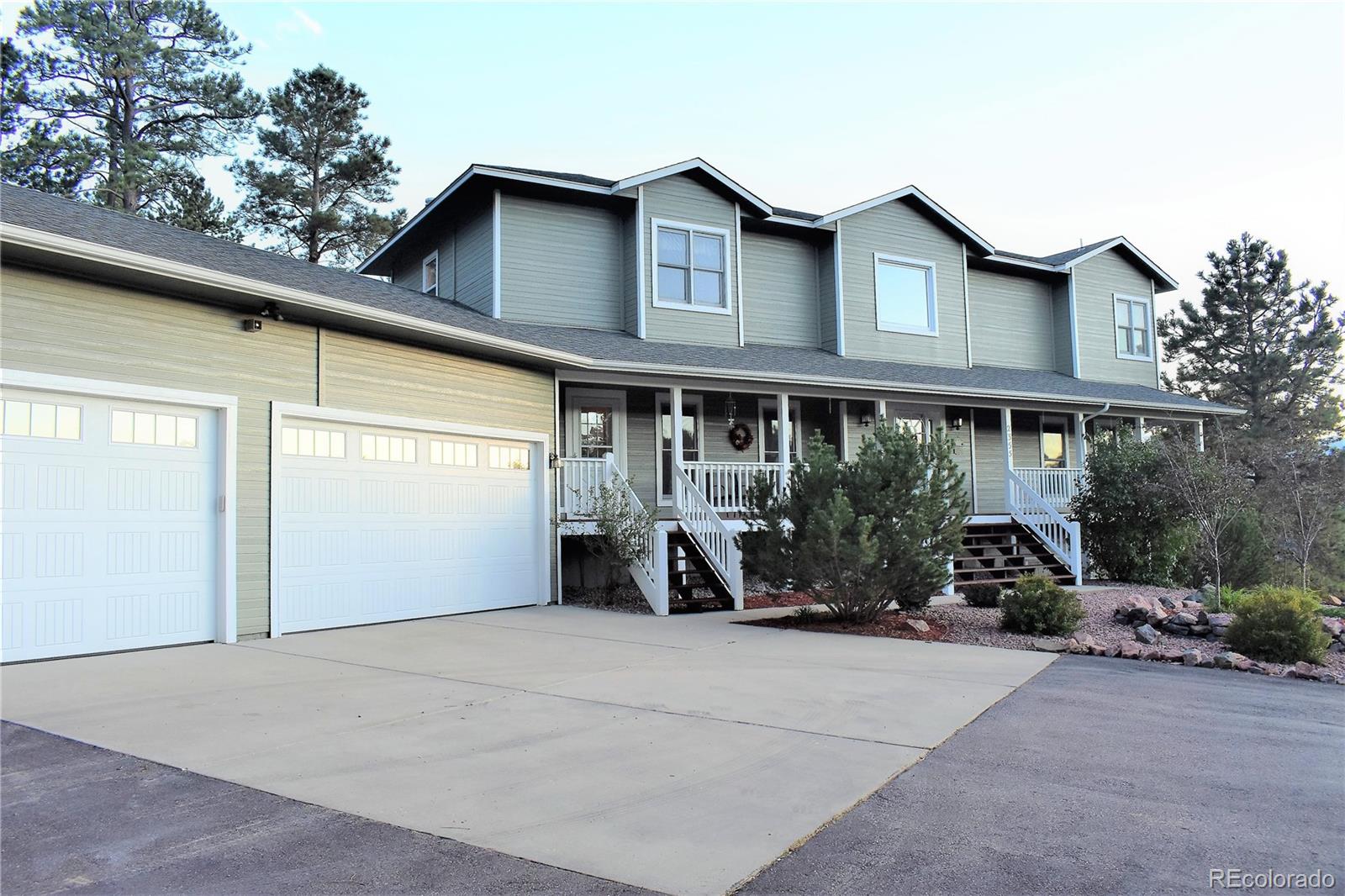 2355 Bricker Road Monument, CO 80132 - Photo 2 of 35 a view of a house with porch