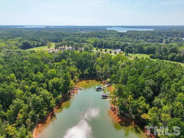 an aerial view of lake residential house with outdoor space