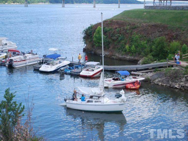 Lot 6 Greenwood Road Boydton, VA 23917 - Photo 28 of 29 a backyard of a house with fire pit and outdoor seating
