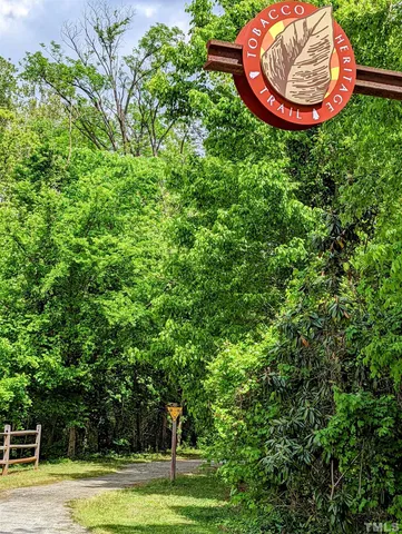 a view of a swimming pool in a backyard
