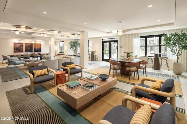 a living room with furniture and a table