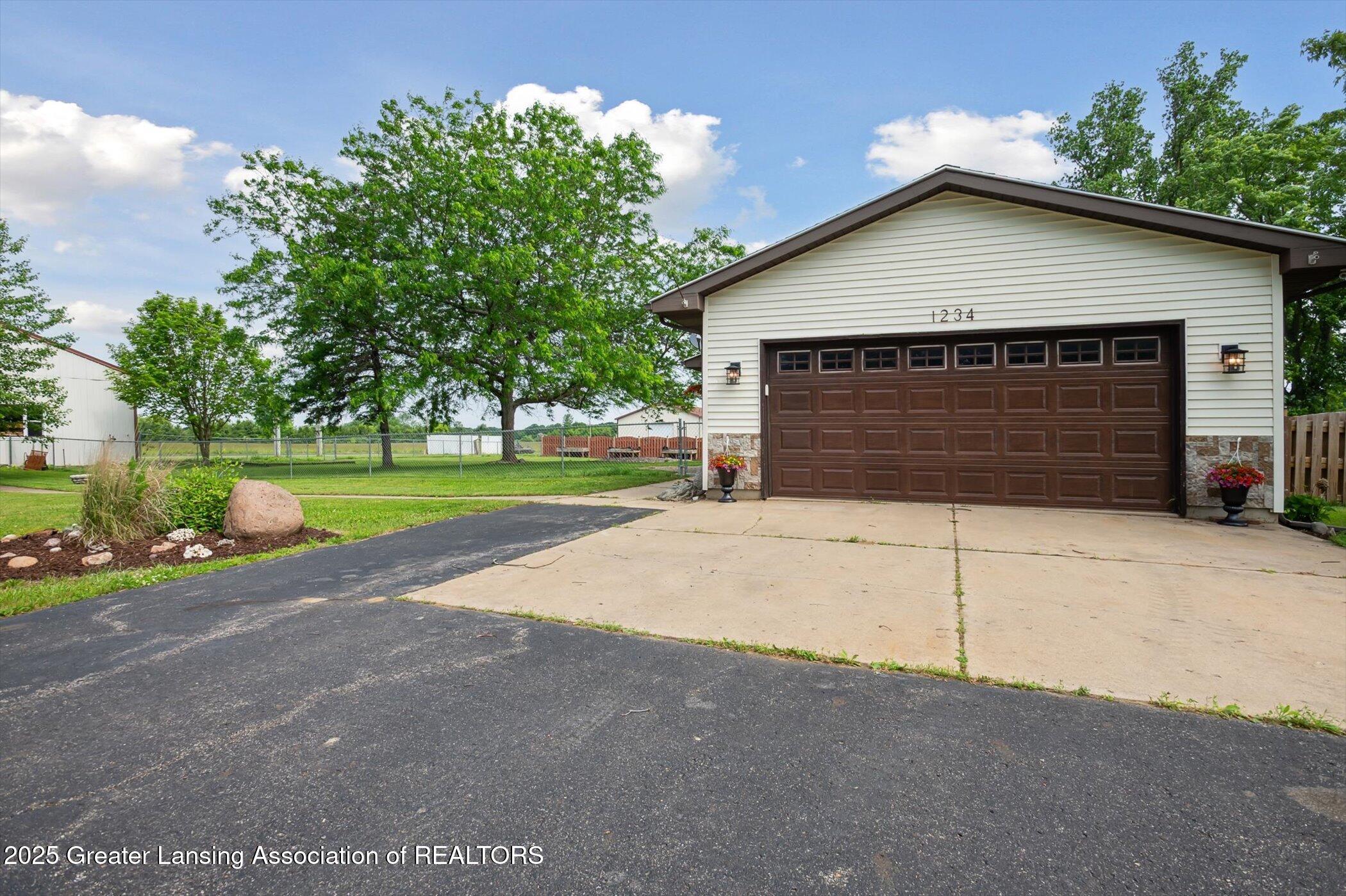1234 Lamb Road Mason, MI 48854 - Photo 3 of 61 03-1234-Lamb-Rd-Mason-MI-48854-WindowSti