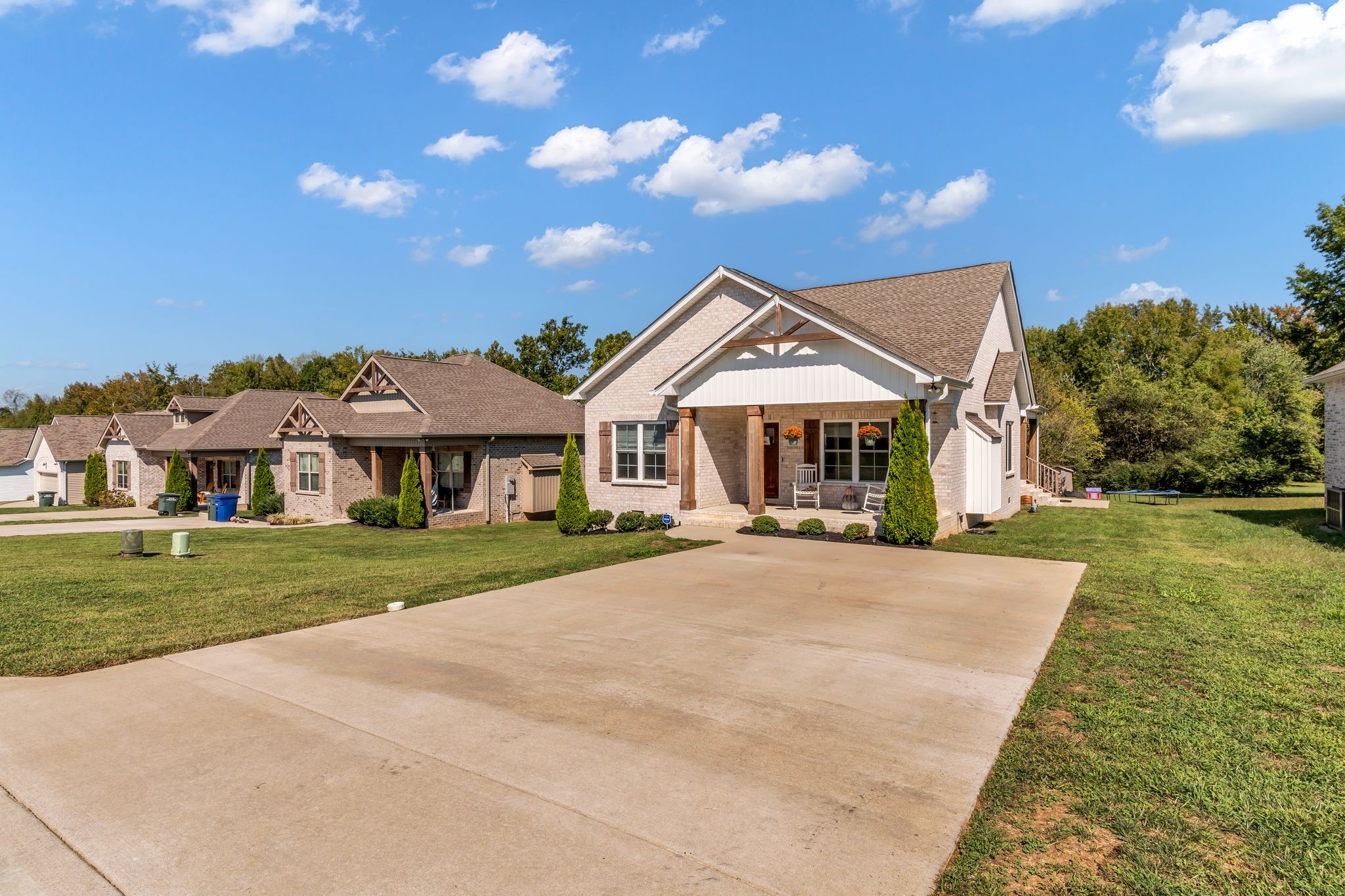 195 Julia Ann Court Springfield, TN 37172 - Photo 26 of 28 a front view of a house with a garden