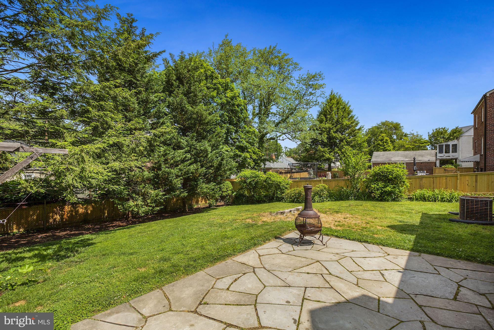 9908 Rogart Road Silver Spring, MD 20901 - Photo 36 of 39 Expansive Yard with Gorgeous Stone Patio