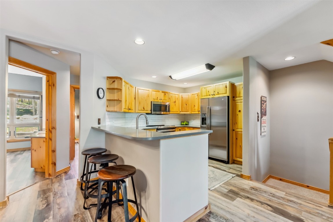 434 Kings Crown Road, Unit 434 Breckenridge, CO 80424 - Photo 13 of 50 a kitchen with counter top space and a sink