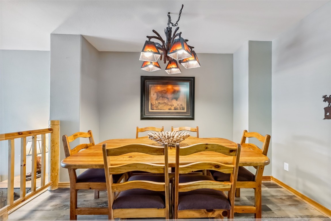434 Kings Crown Road, Unit 434 Breckenridge, CO 80424 - Photo 16 of 50 a dining room with furniture and wooden floor