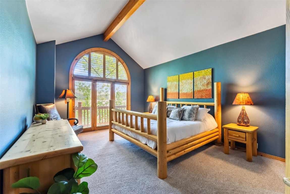 434 Kings Crown Road, Unit 434 Breckenridge, CO 80424 - Photo 20 of 50 a bedroom with furniture and a large window