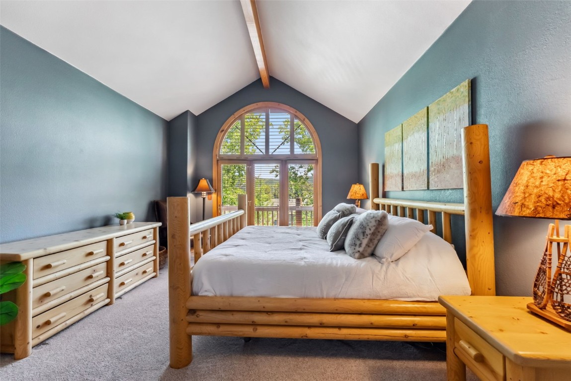 434 Kings Crown Road, Unit 434 Breckenridge, CO 80424 - Photo 22 of 50 a bedroom with furniture and a large window