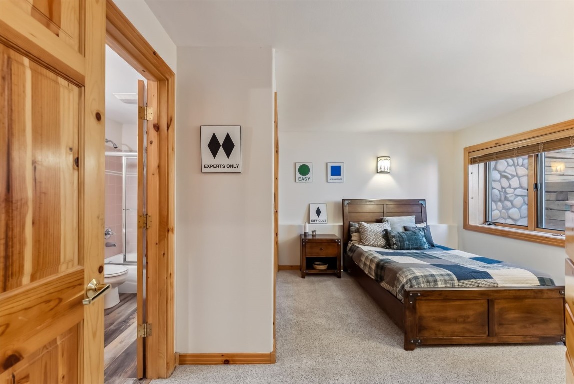 434 Kings Crown Road, Unit 434 Breckenridge, CO 80424 - Photo 29 of 50 a living room with furniture and a window