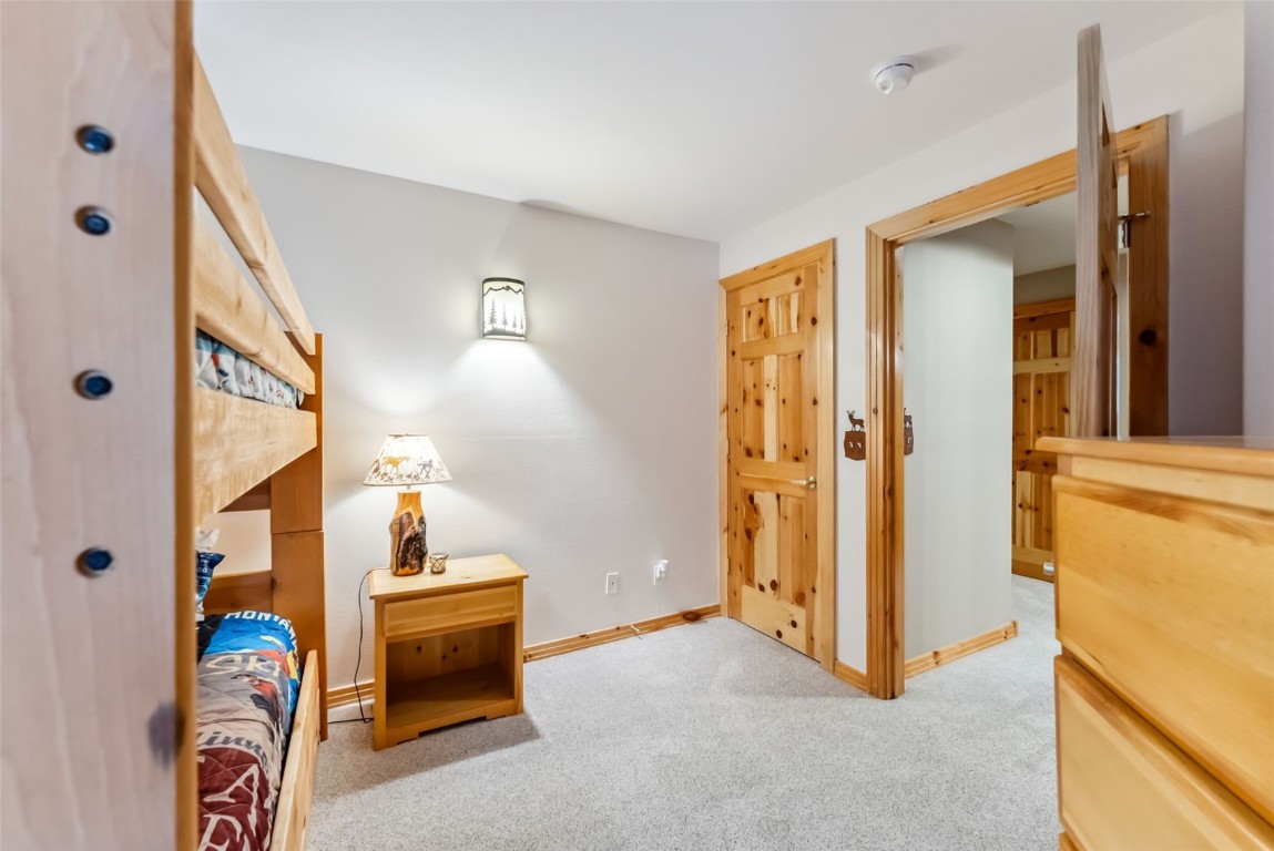 434 Kings Crown Road, Unit 434 Breckenridge, CO 80424 - Photo 31 of 50 wooden floor and bathroom view