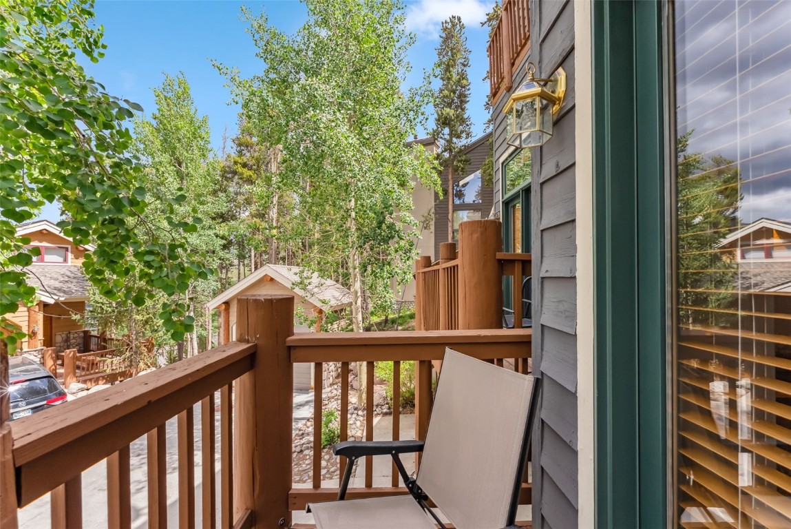 434 Kings Crown Road, Unit 434 Breckenridge, CO 80424 - Photo 44 of 50 a view of a balcony with a tree