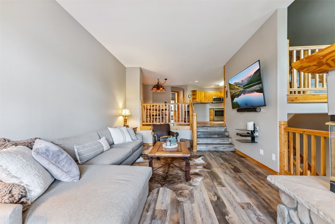 434 Kings Crown Road, Unit 434 Breckenridge, CO 80424 - Photo 9 of 50 a living room with furniture and a flat screen tv