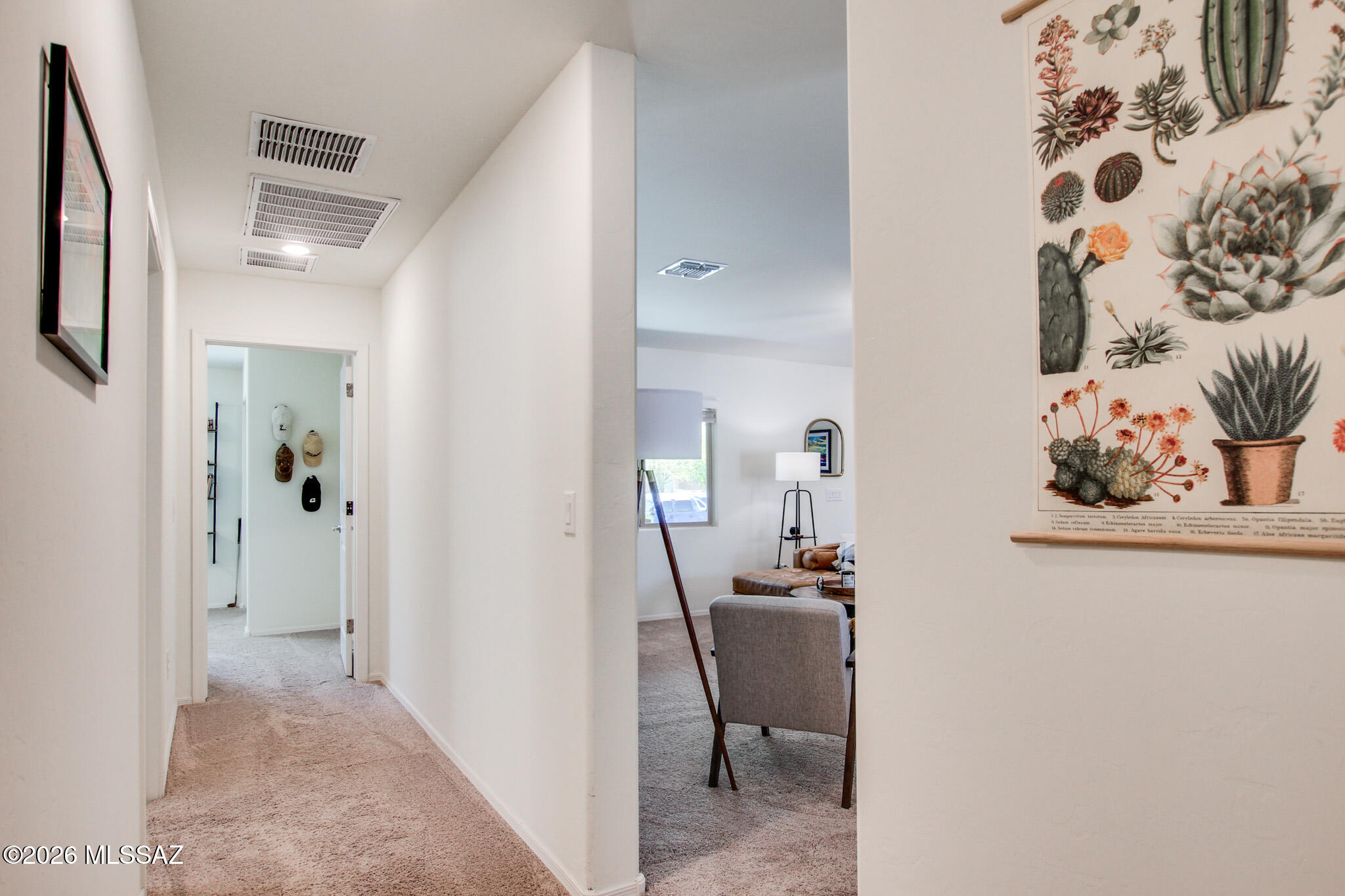 7056 South Draper Road Tucson, AZ 85757 - Photo 13 of 22 a view of a hallway and interior of a house