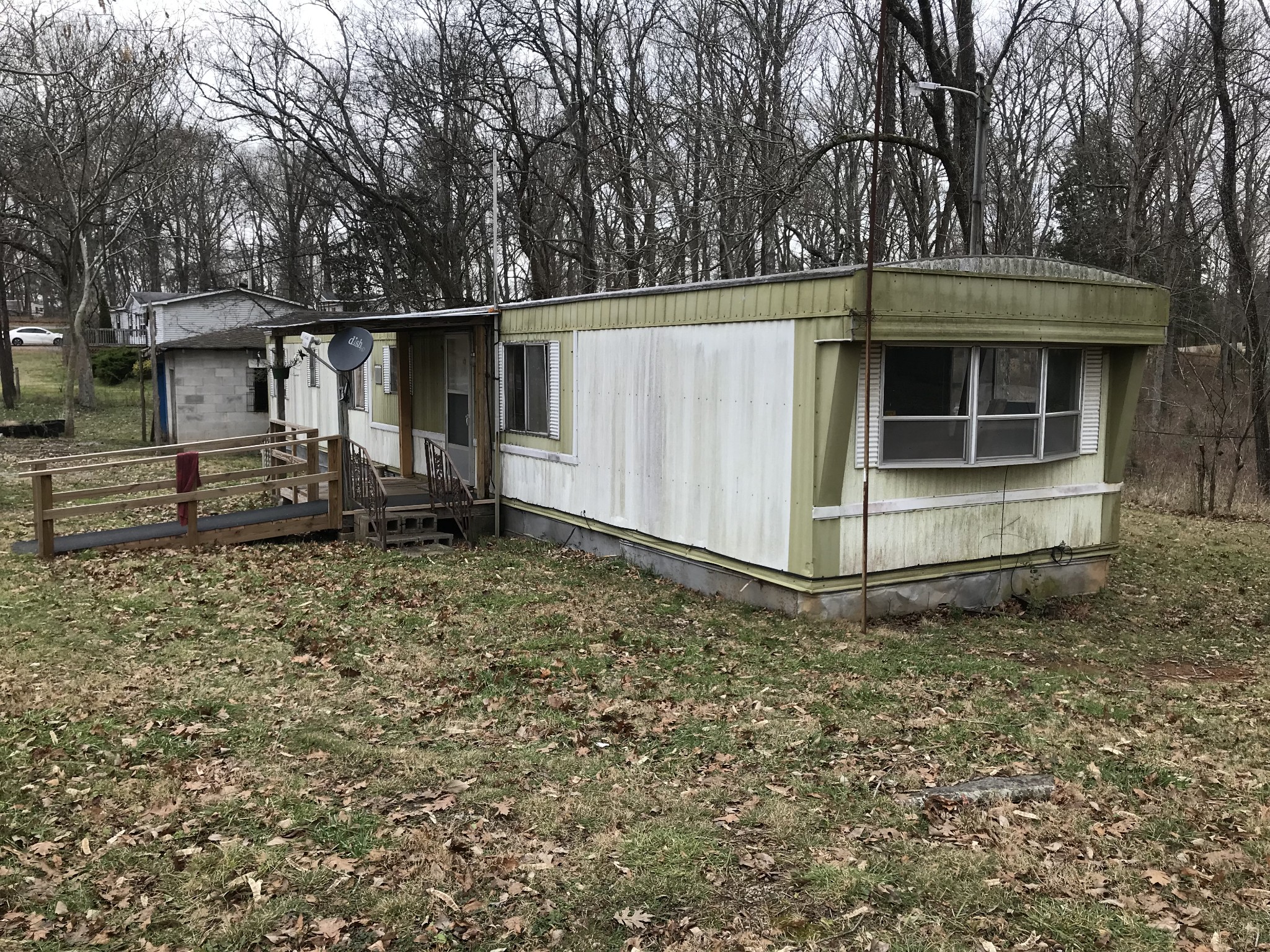211 Ramsey Road Lebanon, TN 37087 - Photo 15 of 17 a view of a house with backyard and trees