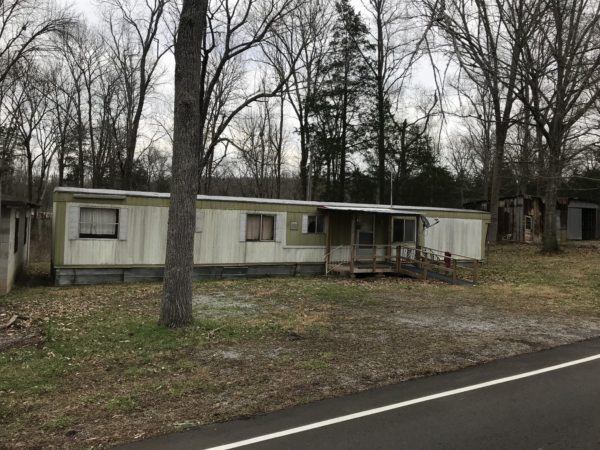 211 Ramsey Road Lebanon, TN 37087 - Photo 16 of 17 a view of a house with a yard