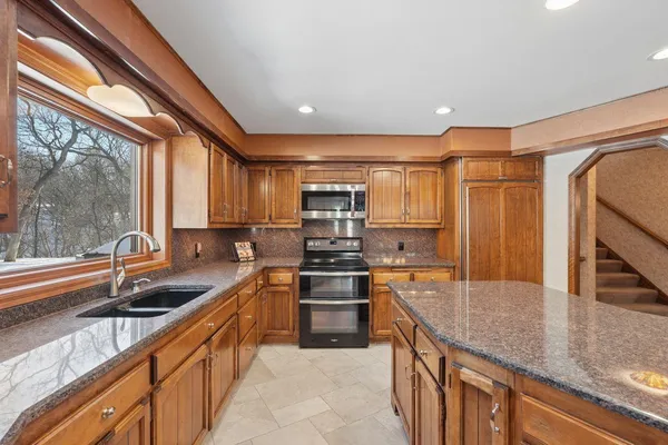 $885,000 | 6175 Heather Place, Fridley, MN 55432
