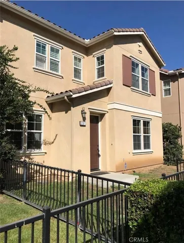 a front view of a house with a porch