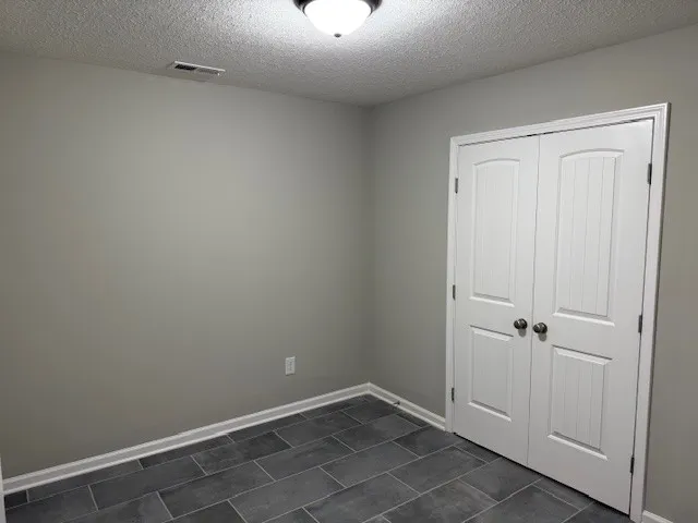 a view of a room with rack on the wall