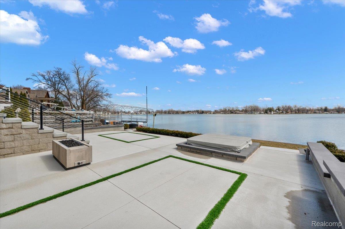 13459 Haddon Street Fenton, MI 48430 - Photo 64 of 84 View of patio / terrace with a water view