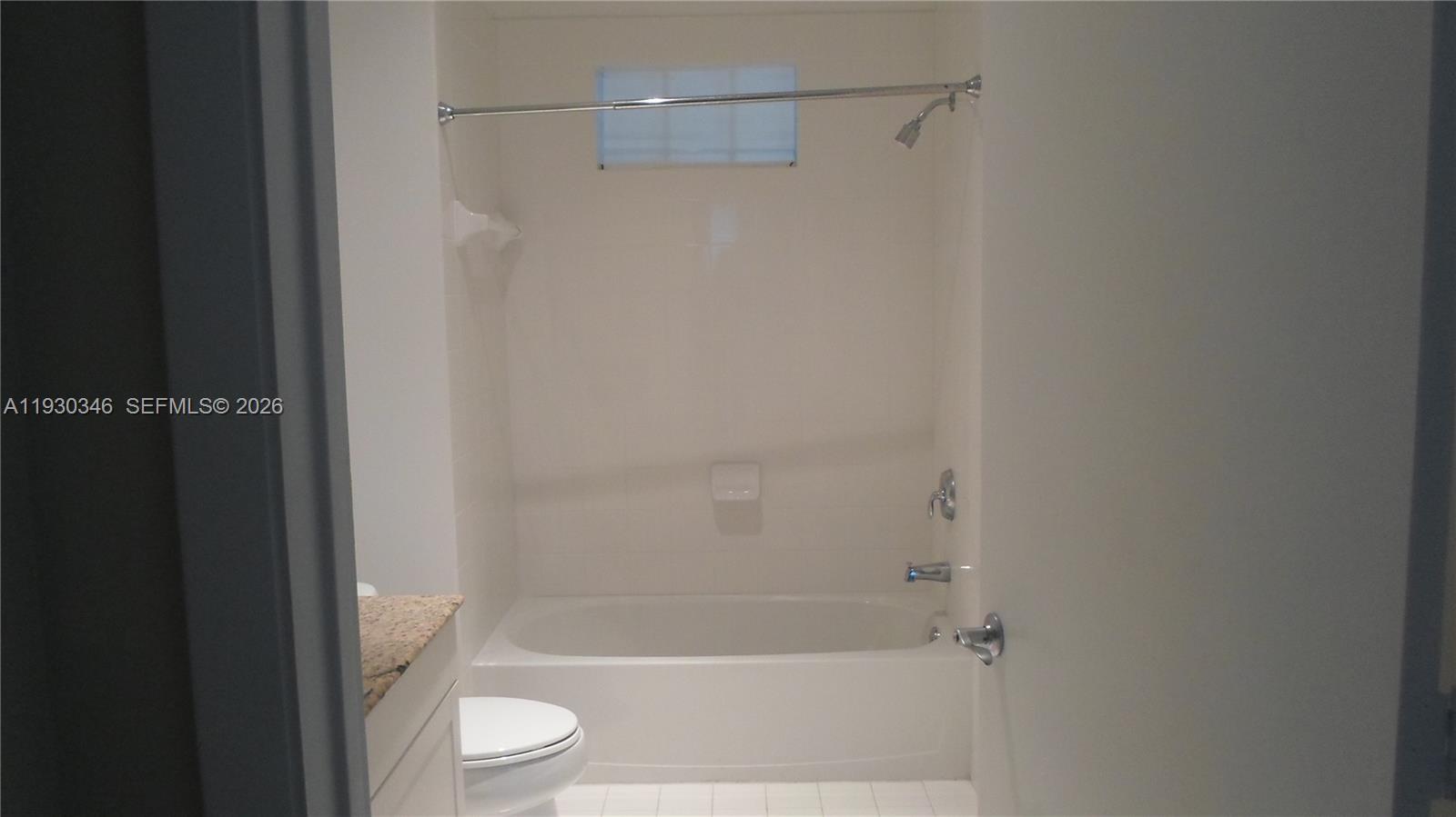 7275 Southwest 90th Way, Unit G 611 Miami, FL 33156 - Photo 10 of 56 a bathroom with a bathtub and a shower