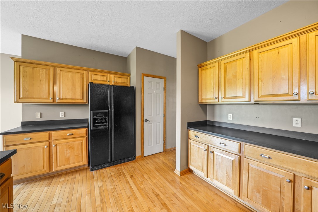 4840 Wayne Road Mantua, OH 44255 - Photo 11 of 42 Huge kitchen with hardwood floors, maple cabinetry and tons of counter space