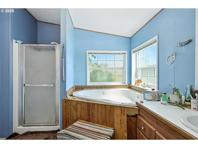 a kitchen with a sink and a refrigerator