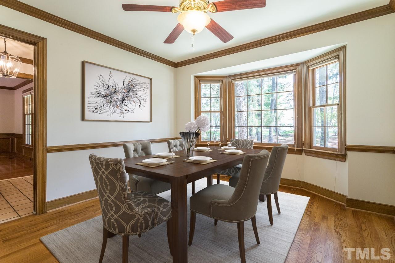2700 Farnborough Road Raleigh, NC 27613 - Photo 34 of 36 a view of a dining room with furniture window and wooden floor