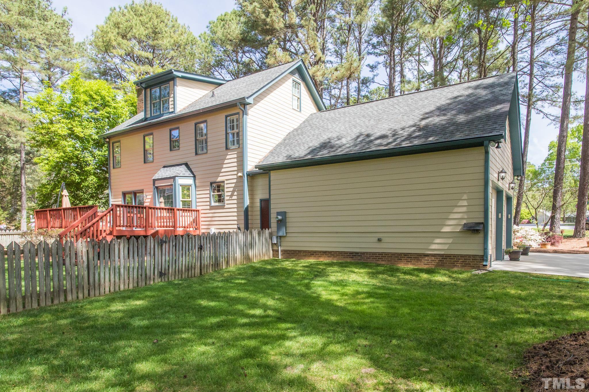 2700 Farnborough Road Raleigh, NC 27613 - Photo 6 of 36 a view of a house with a yard