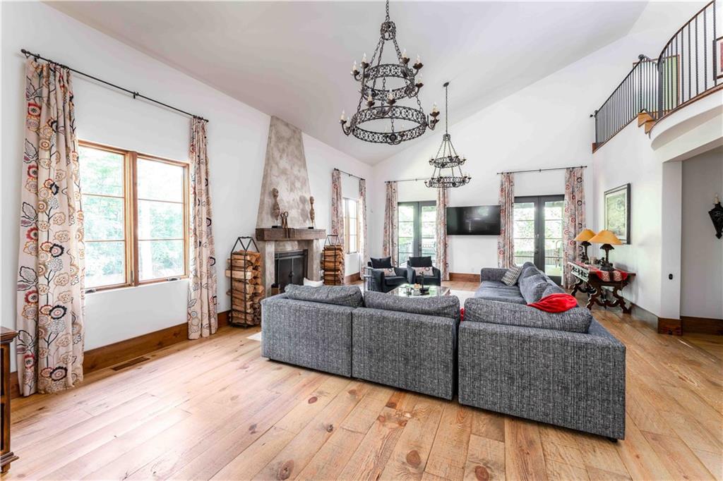 3118 West Roxboro Road Northeast Atlanta, GA 30324 - Photo 15 of 68 a living room with furniture or chandelier and a wooden floor