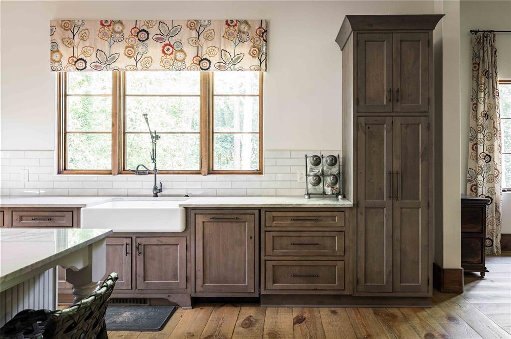 3118 West Roxboro Road Northeast Atlanta, GA 30324 - Photo 26 of 68 a kitchen with a sink cabinets and window