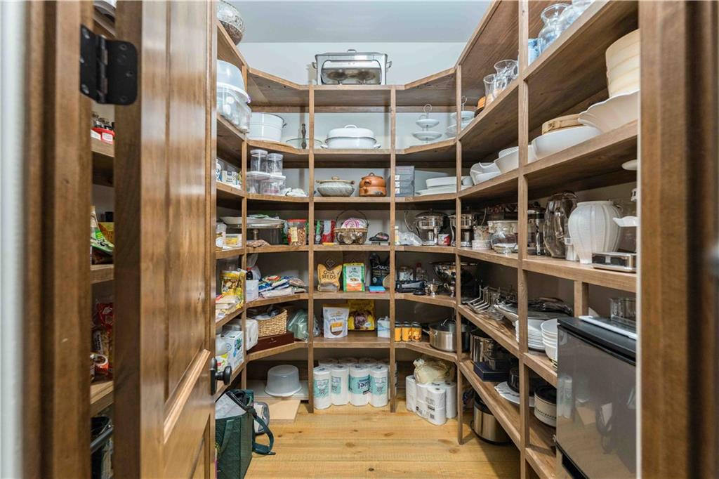 3118 West Roxboro Road Northeast Atlanta, GA 30324 - Photo 30 of 68 a view of a store room with shelves