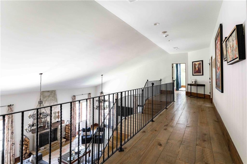 3118 West Roxboro Road Northeast Atlanta, GA 30324 - Photo 39 of 68 a view of a hallway with wooden floor