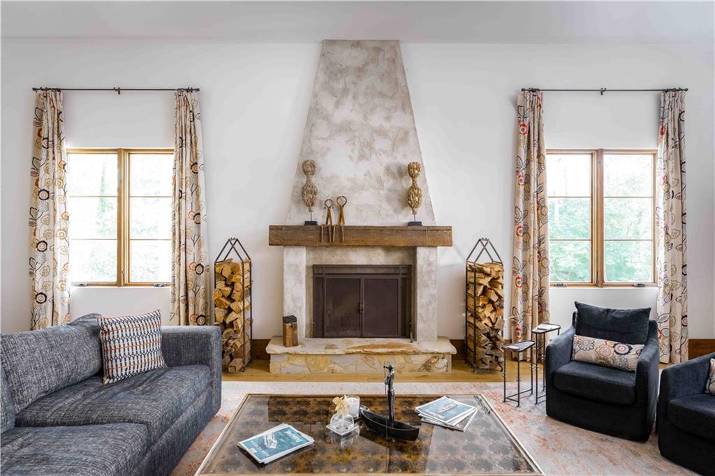 3118 West Roxboro Road Northeast Atlanta, GA 30324 - Photo 4 of 68 a living room with furniture and a fireplace