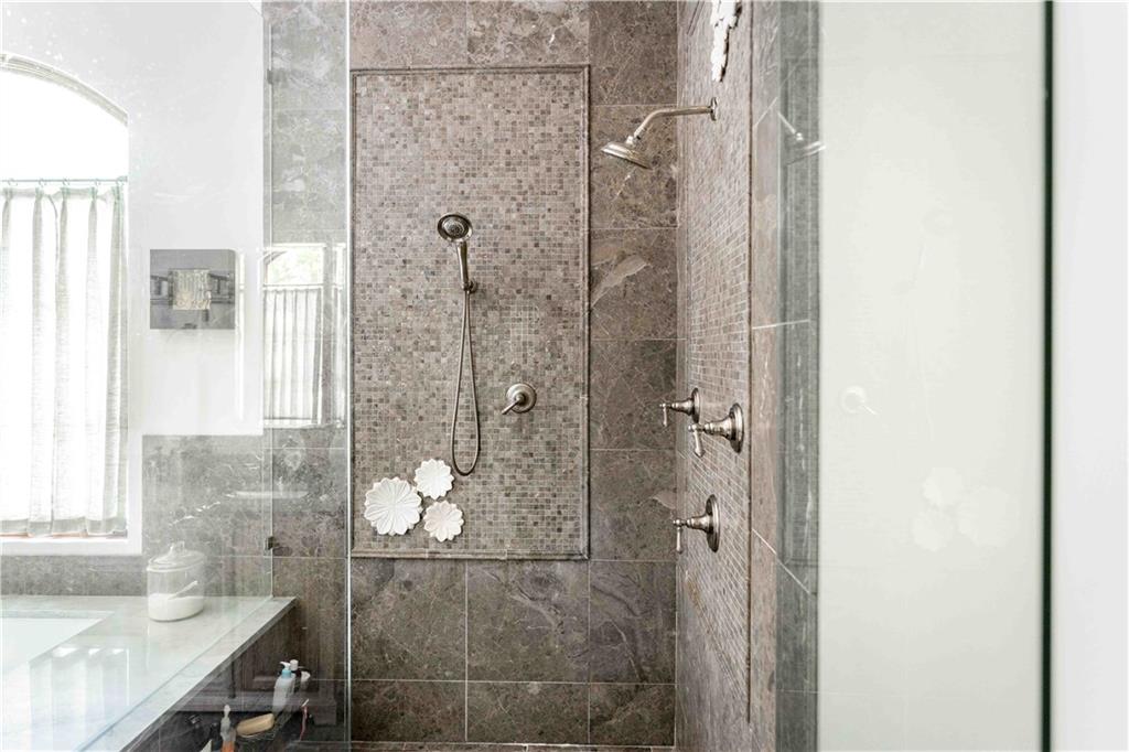 3118 West Roxboro Road Northeast Atlanta, GA 30324 - Photo 44 of 68 a bathroom with a shower and a sink