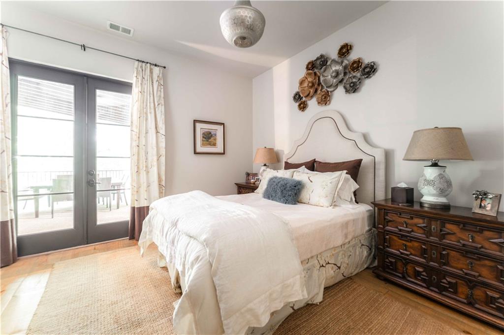 3118 West Roxboro Road Northeast Atlanta, GA 30324 - Photo 49 of 68 a bedroom with a bed and a window