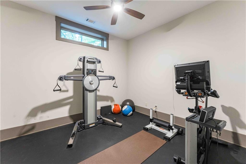 3118 West Roxboro Road Northeast Atlanta, GA 30324 - Photo 61 of 68 a view of a room with gym equipment