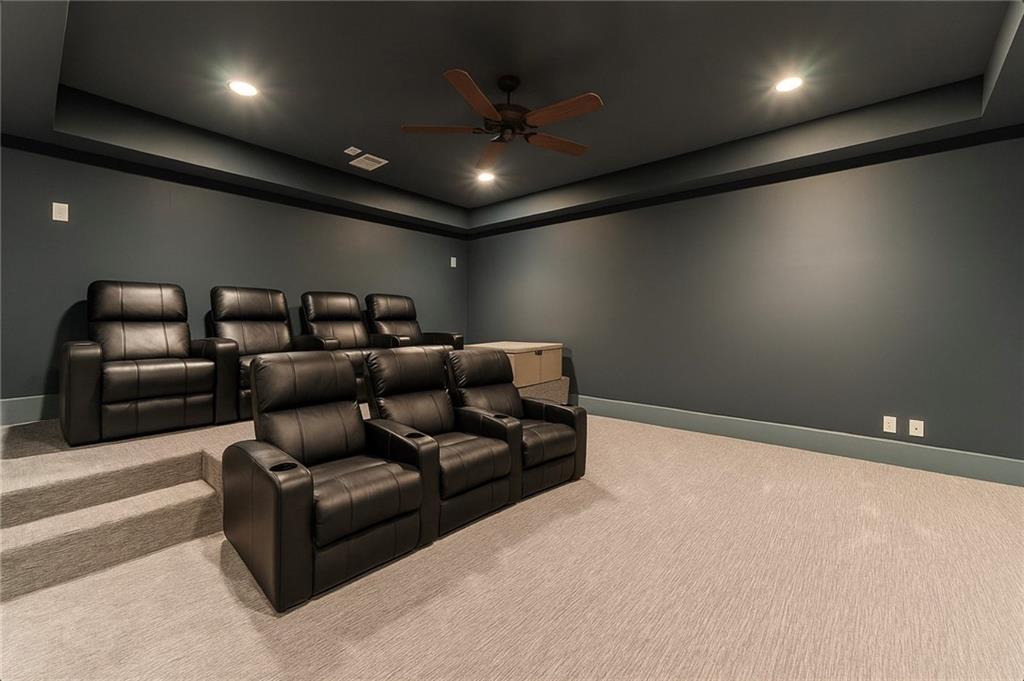 3118 West Roxboro Road Northeast Atlanta, GA 30324 - Photo 62 of 68 a media room with lots of chairs and a projector screen