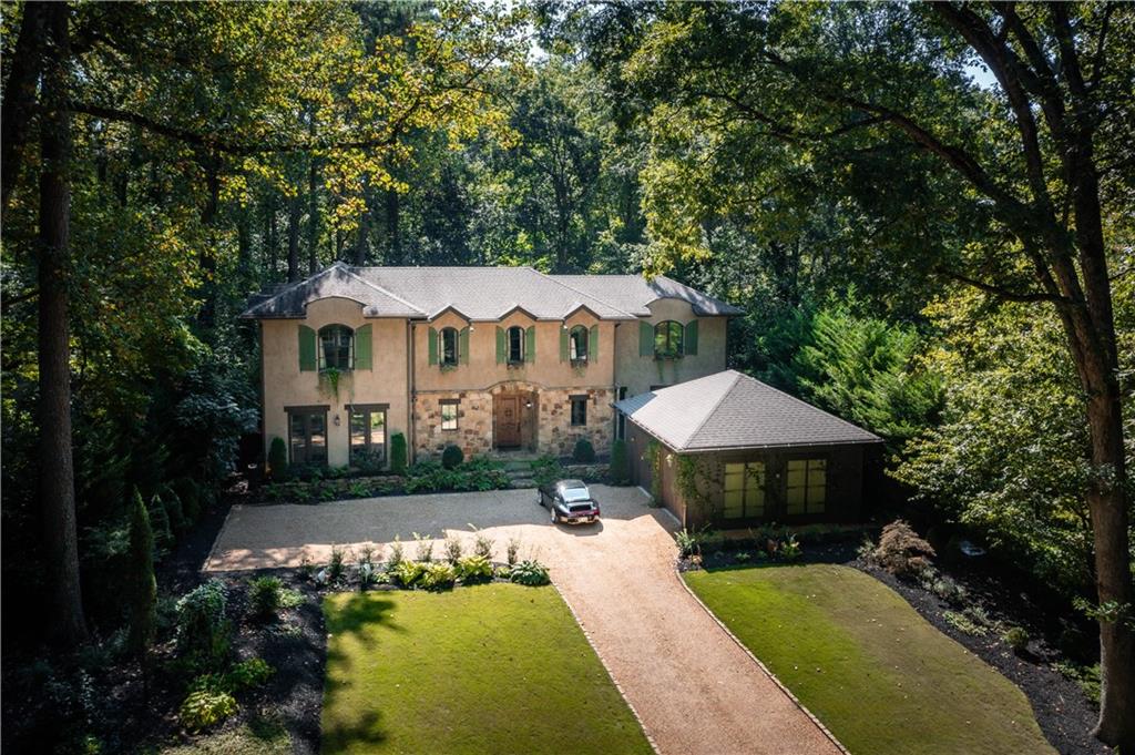 3118 West Roxboro Road Northeast Atlanta, GA 30324 - Photo 68 of 68 a house with swimming pool in front of it