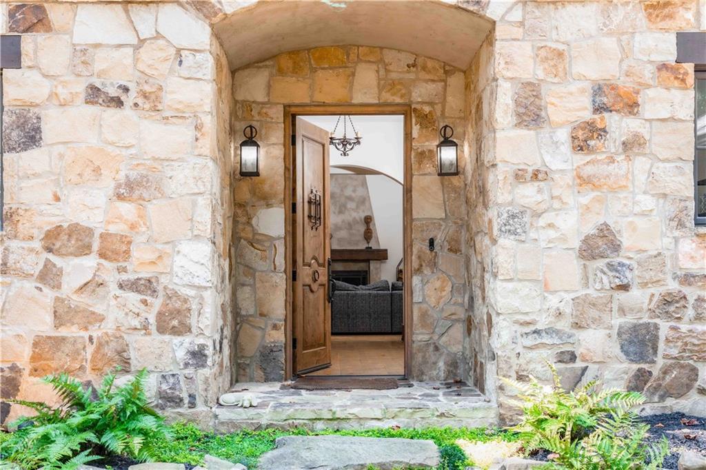 3118 West Roxboro Road Northeast Atlanta, GA 30324 - Photo 10 of 68 a front view of a house with a yard