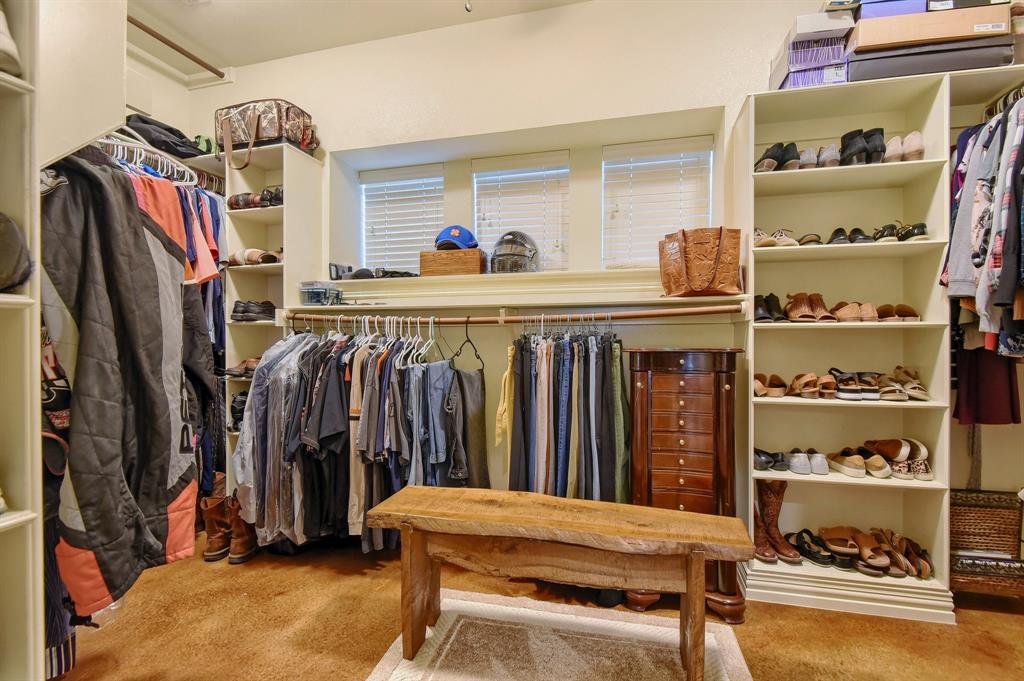 710 Highway 82 Bells, TX 75414 - Photo 22 of 40 a view of walk in closet with clothes and shoes