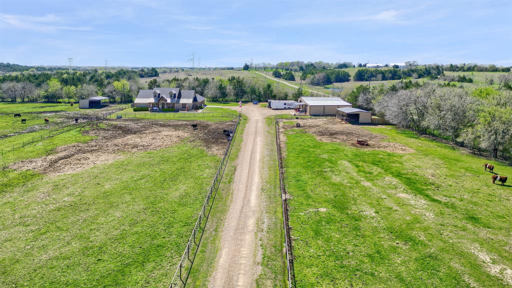 710 Highway 82 Bells, TX 75414 - Photo 6 of 40 a view of a garden with an outdoor seating