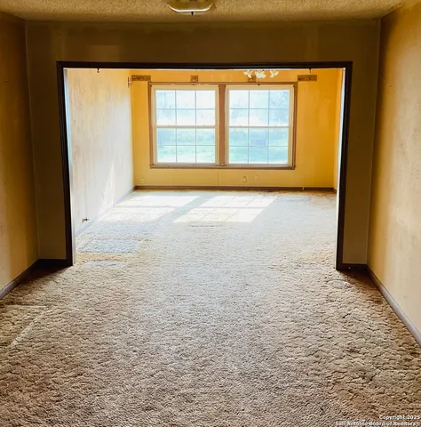 an empty room with a window