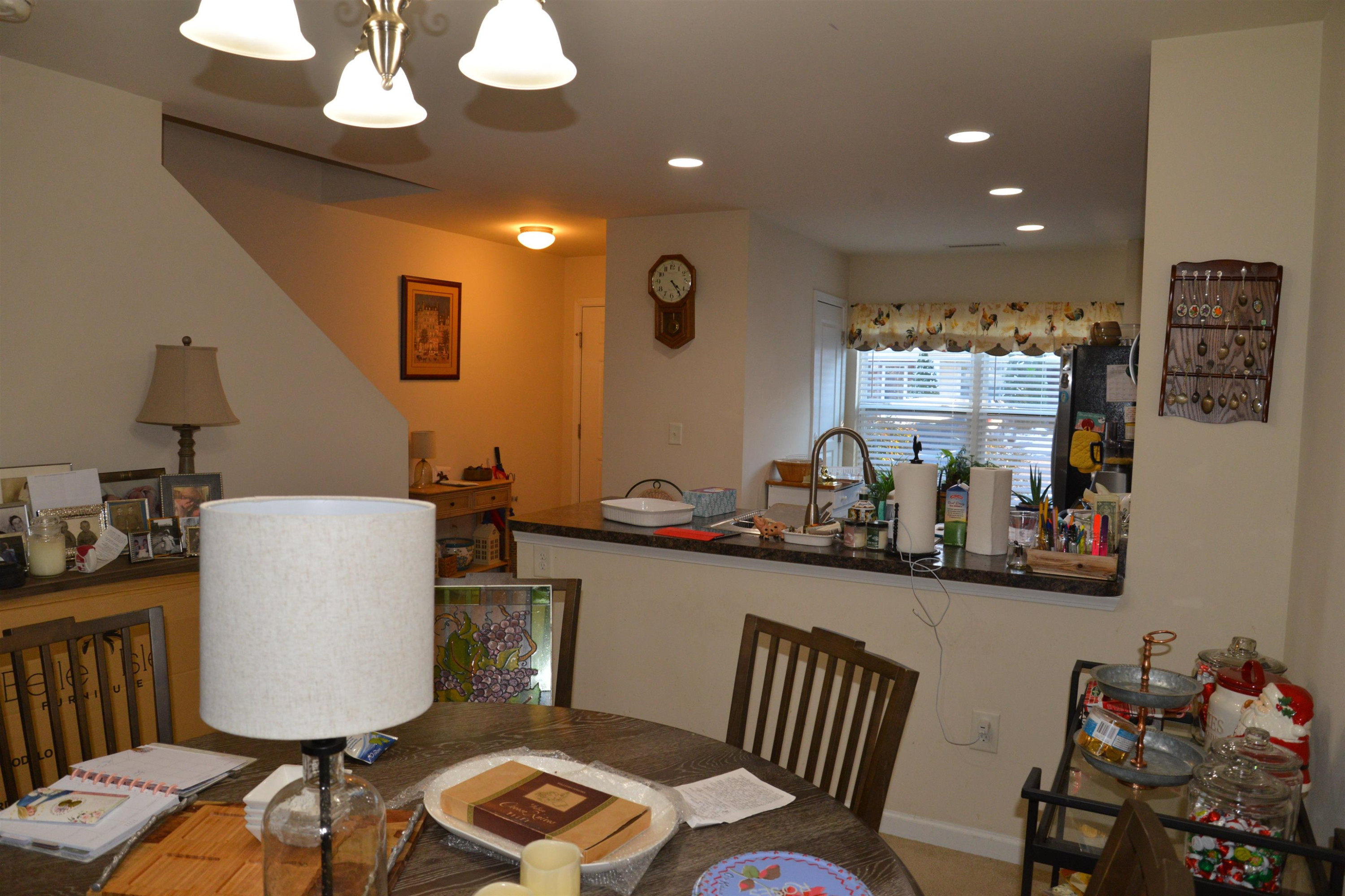 8533 Quarton Drive Raleigh, NC 27616 - Photo 20 of 20 a view of a dining room with furniture and wooden floor