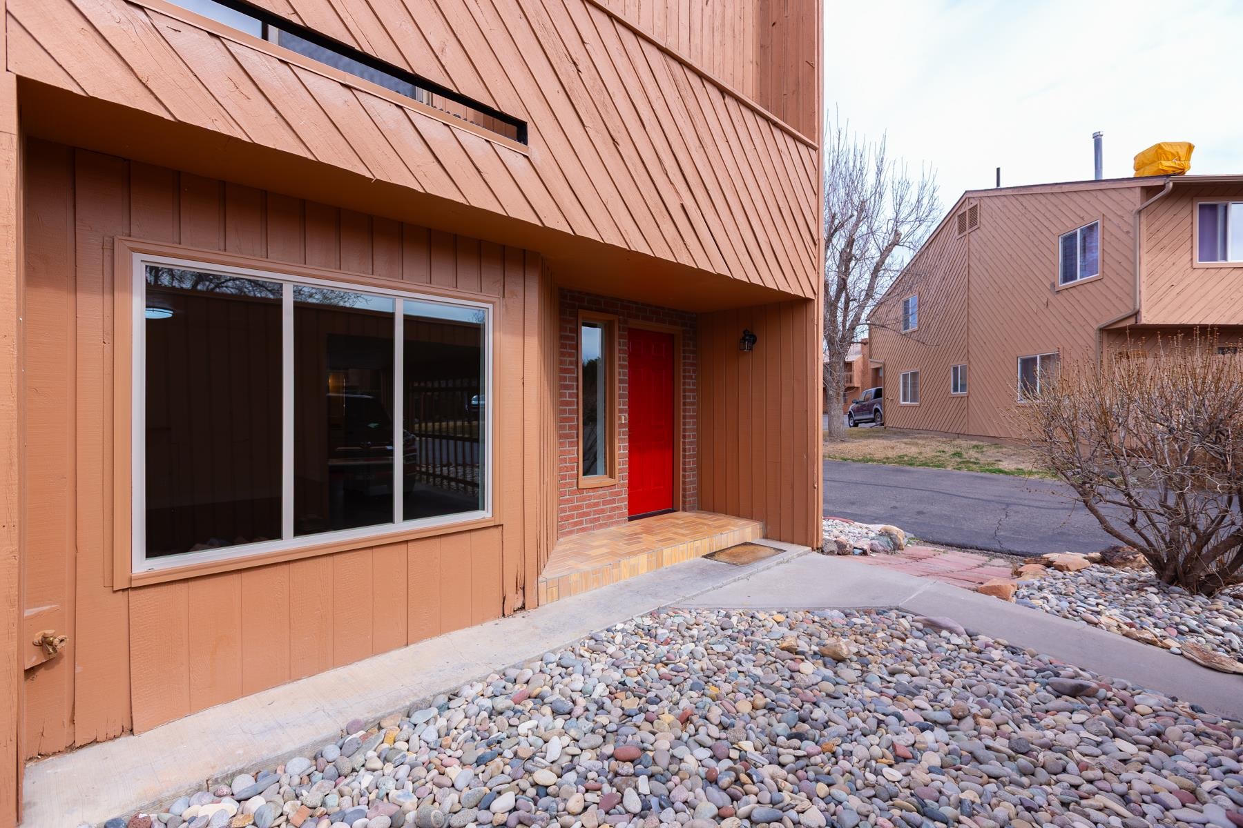 575-28 28 1/2 Road, Unit 44 Grand Junction, CO 81501 - Photo 32 of 39 a view of a house with a backyard