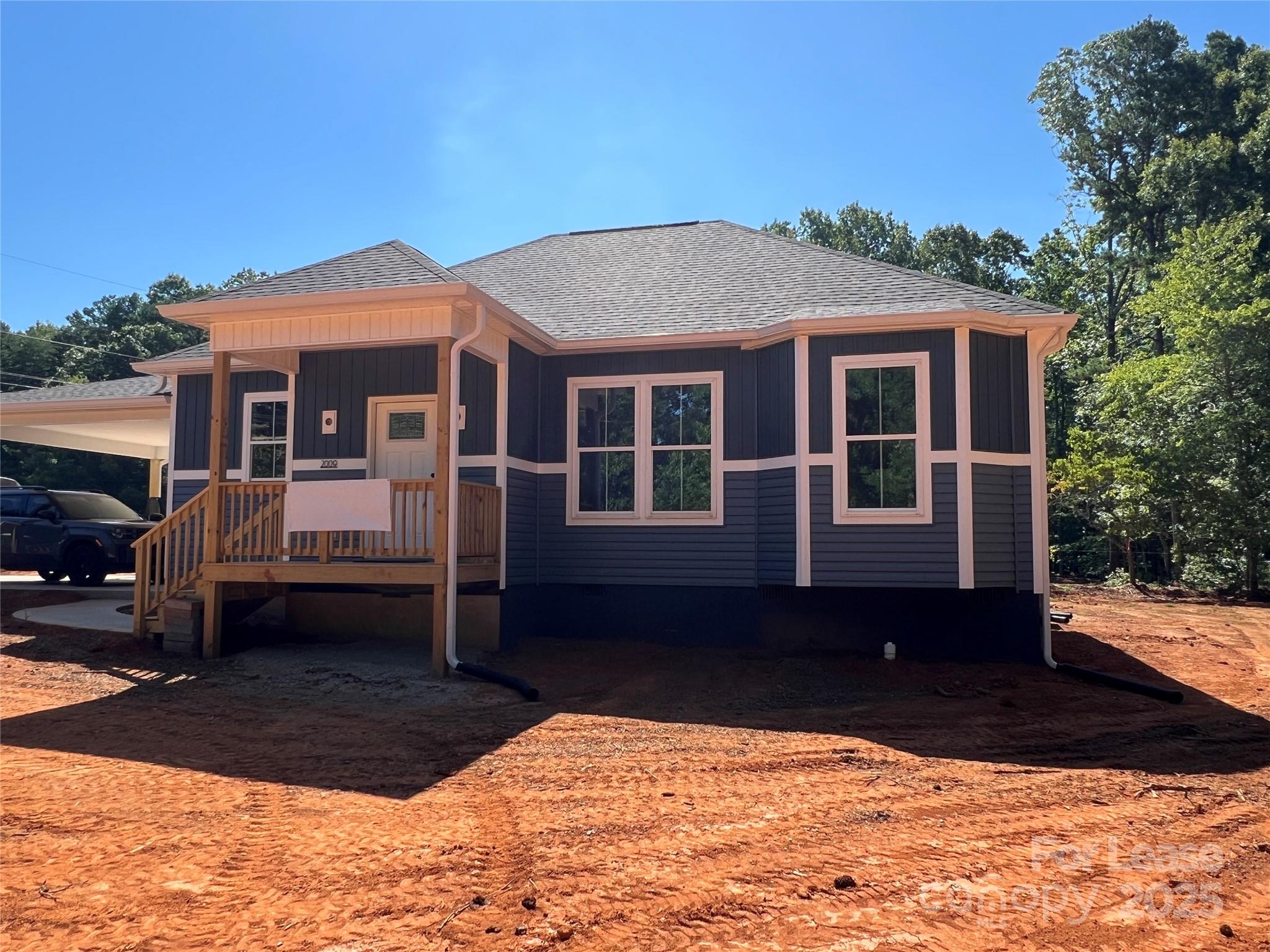 2009 Robert Rufty Lane Catawba, NC 28609 - Photo 1 of 17 a front view of a house with a yard