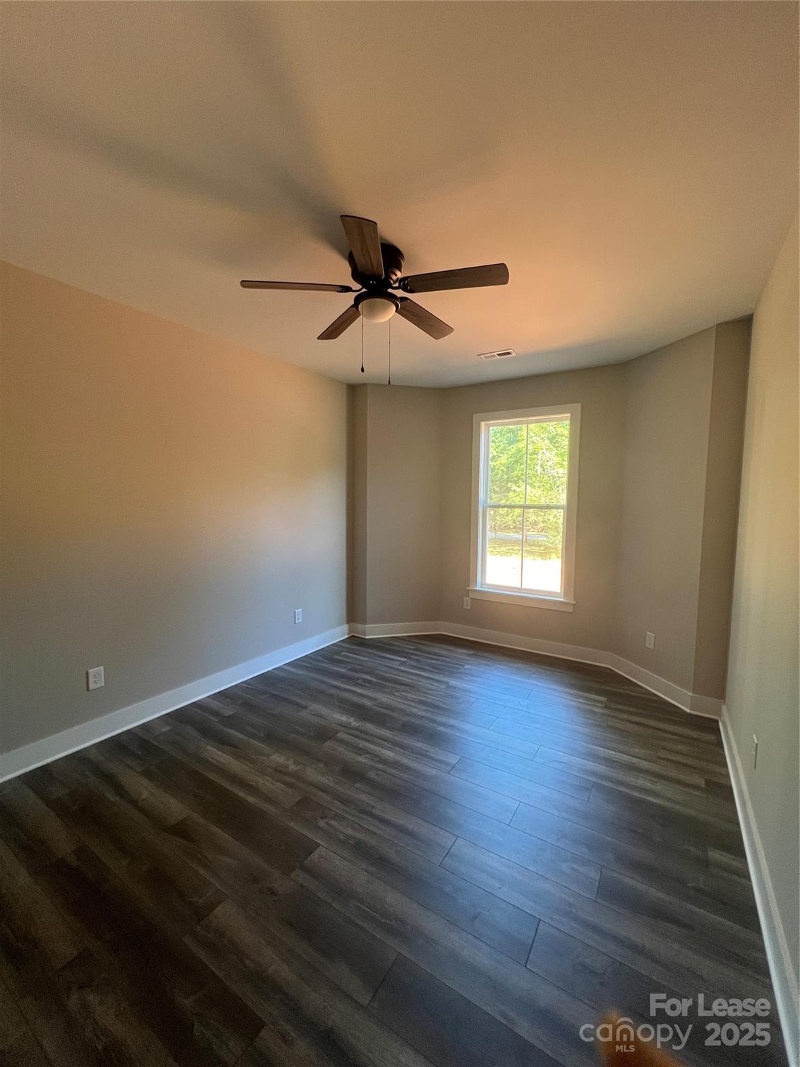 2009 Robert Rufty Lane Catawba, NC 28609 - Photo 16 of 17 an empty room with wooden floor and windows