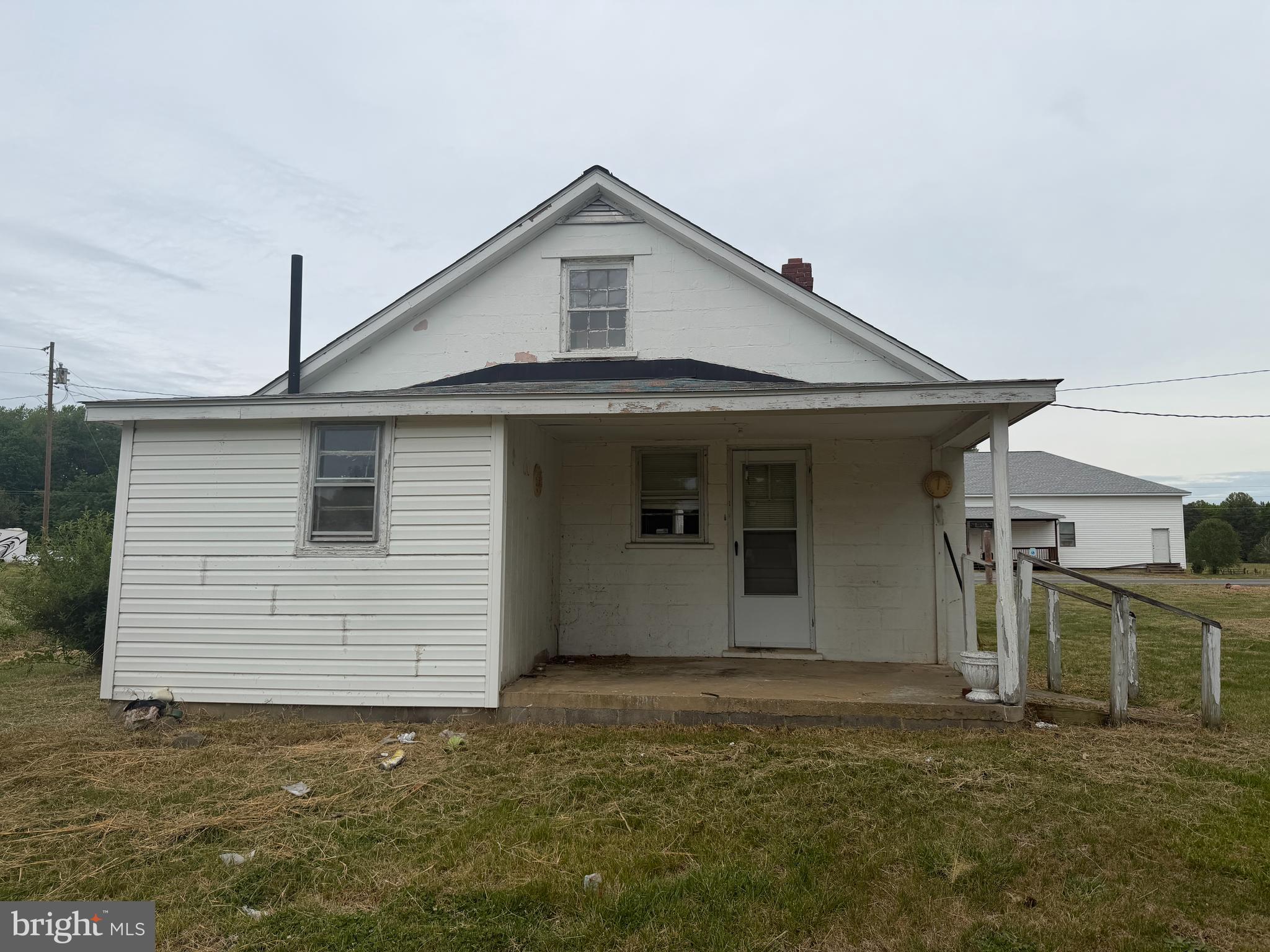7114 Marye Road Spotsylvania, VA 22551 - Photo 4 of 11 a front view of a house with a yard