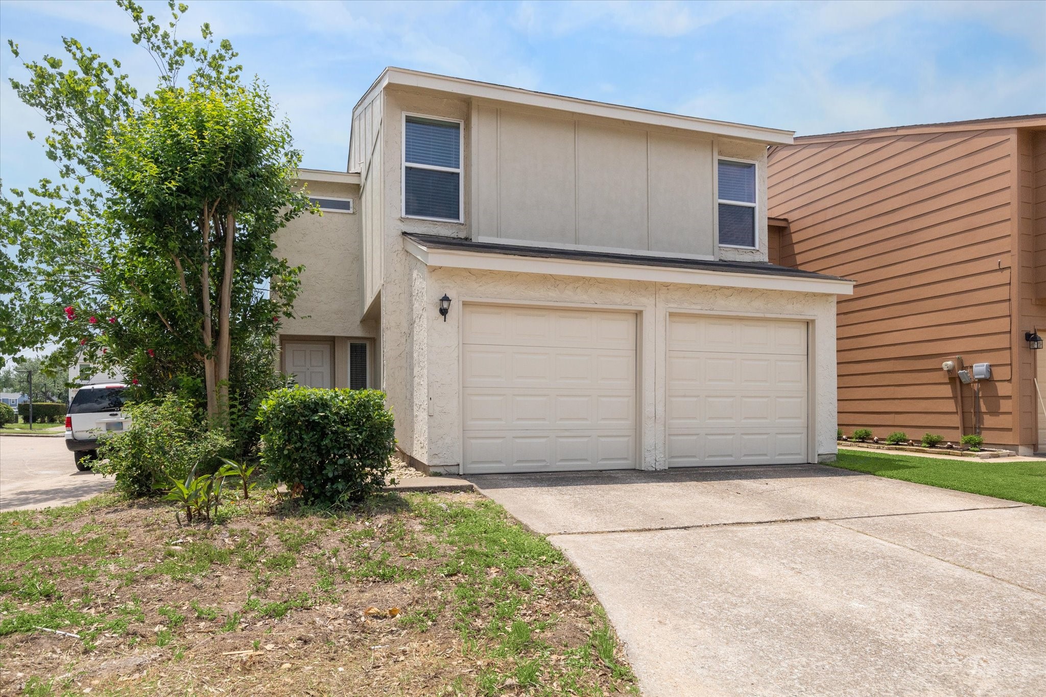 a view of a house with a garage