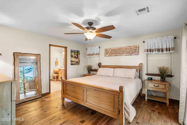a bathroom with a sink double vanity and a mirror
